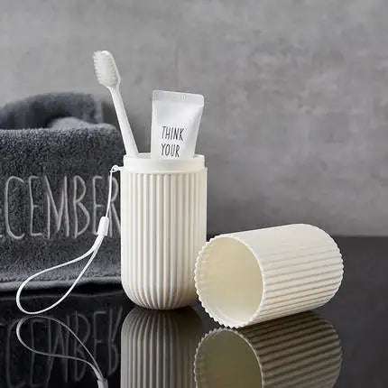 Travel toileting cup toothbrush